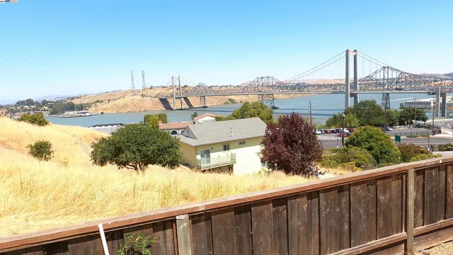 a view of a lake from a balcony