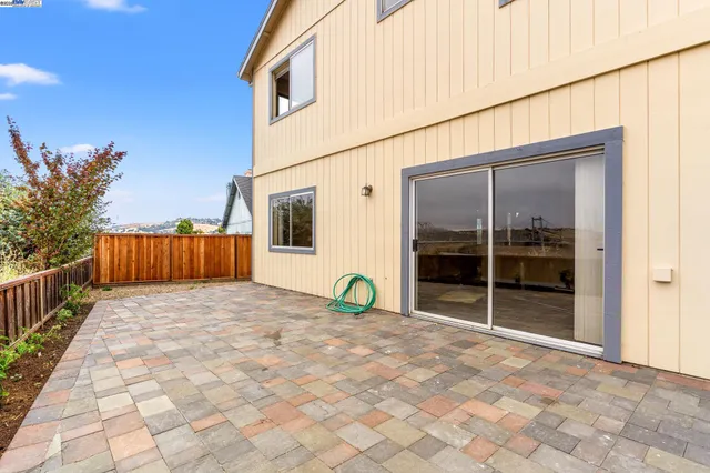 a view of front door and yard