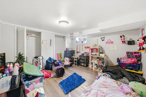 a bed room with furniture and a couch