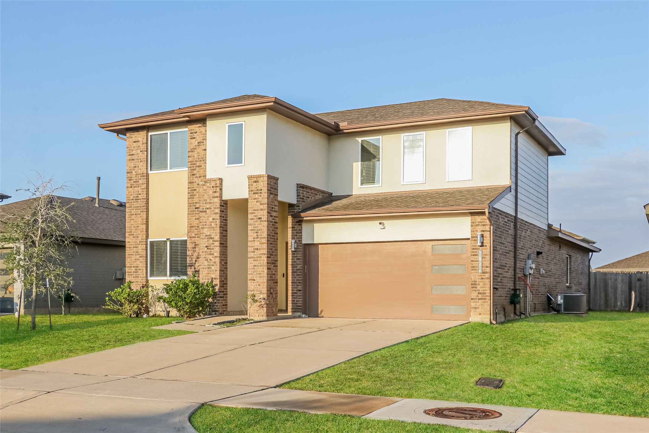 7322 Ramsgate Cliff Lane Richmond, TX 77407 - Photo 1 of 17 a front view of a house with a yard and garage