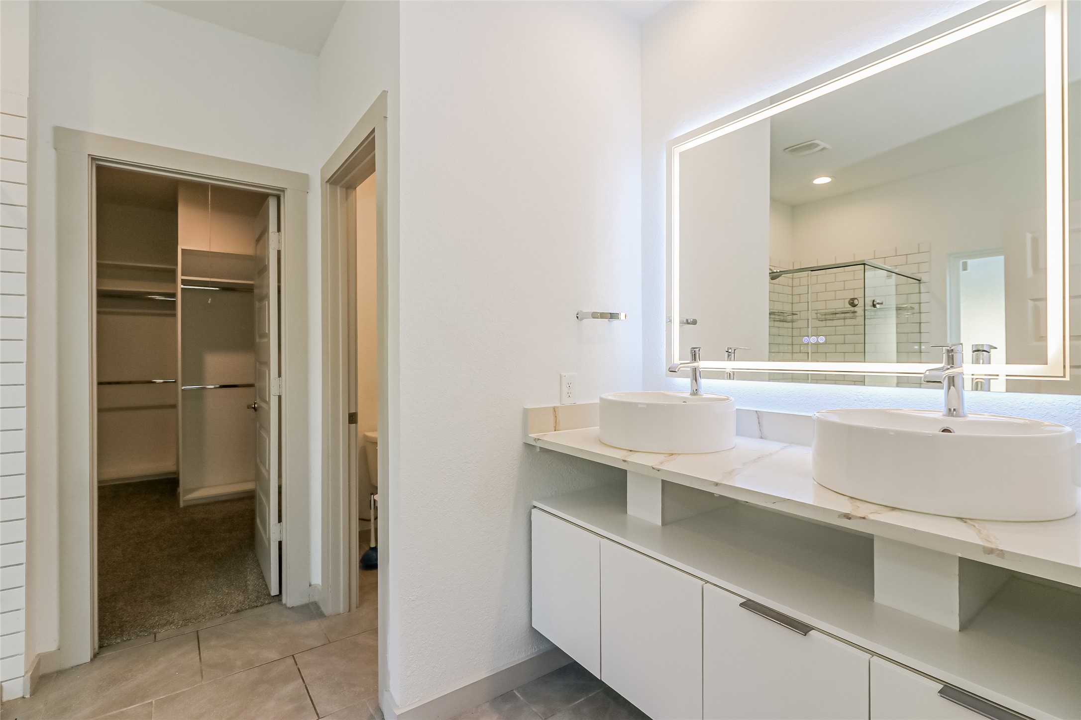7322 Ramsgate Cliff Lane Richmond, TX 77407 - Photo 12 of 17 a bathroom with a sink and a mirror