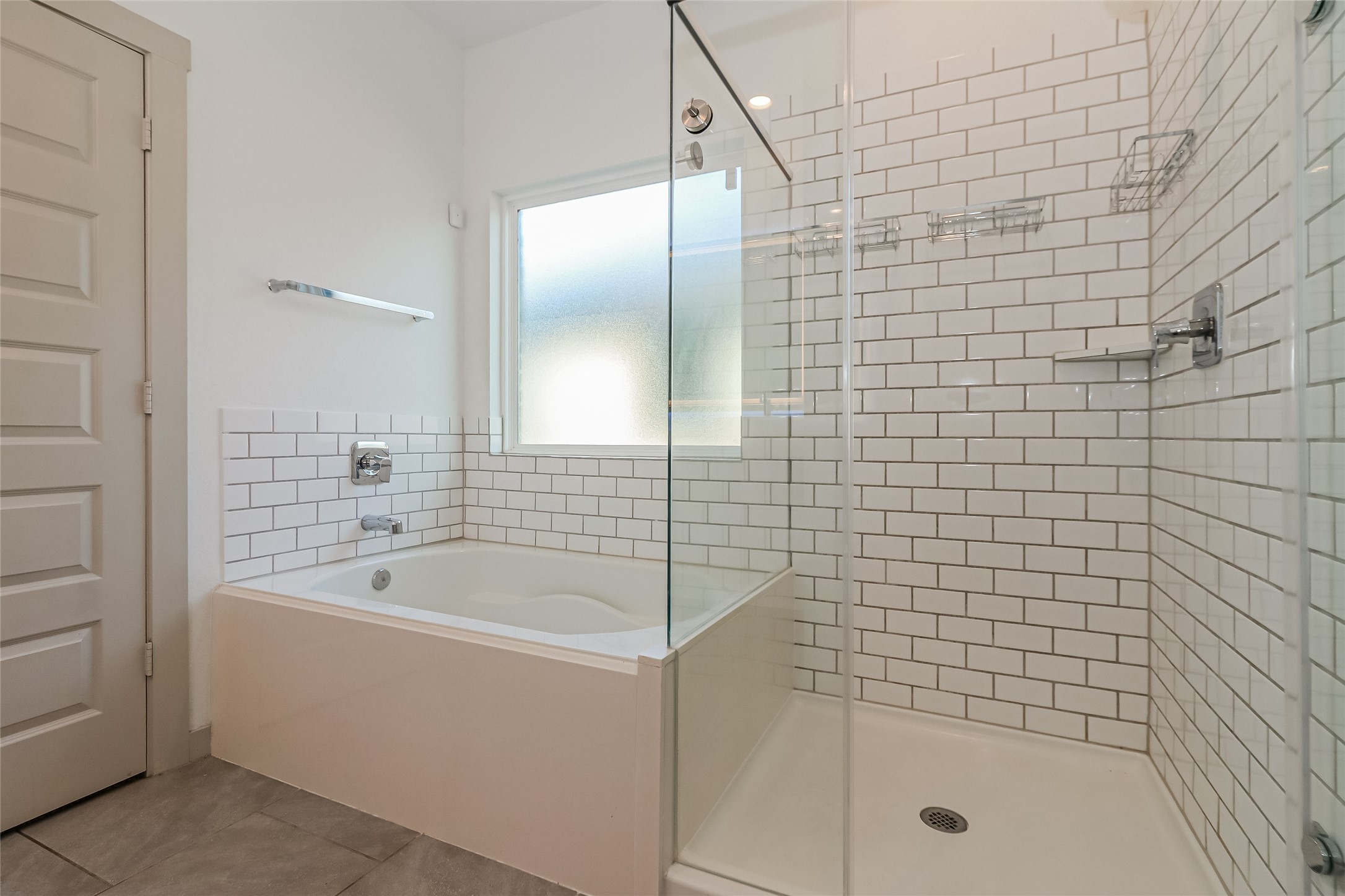 7322 Ramsgate Cliff Lane Richmond, TX 77407 - Photo 13 of 17 a bathroom with a bathtub and shower