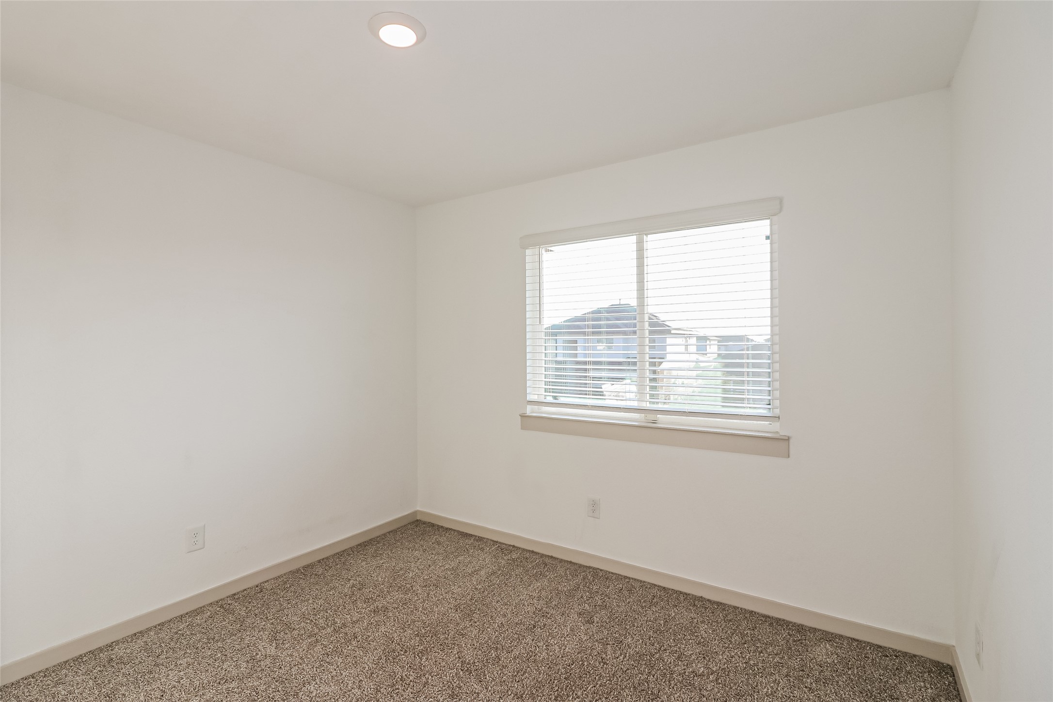 7322 Ramsgate Cliff Lane Richmond, TX 77407 - Photo 15 of 17 an empty room with a window