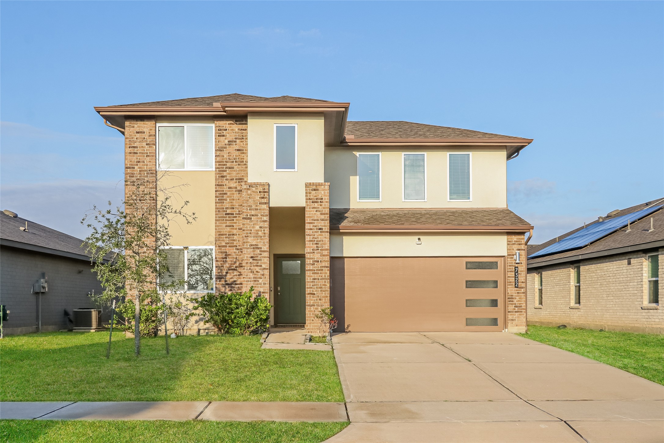 7322 Ramsgate Cliff Lane Richmond, TX 77407 - Photo 2 of 17 a front view of a house with a yard