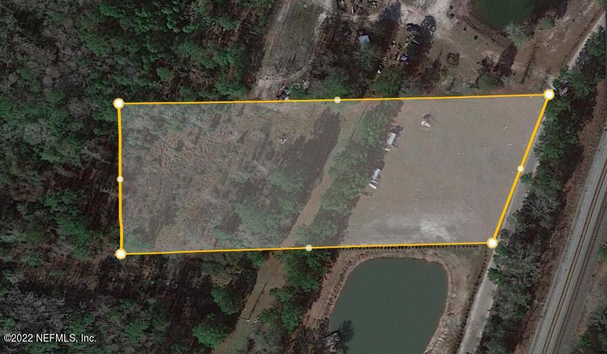 0 Brooks Road Bryceville, FL 32009 - Photo 5 of 5 an aerial view of a house with a yard