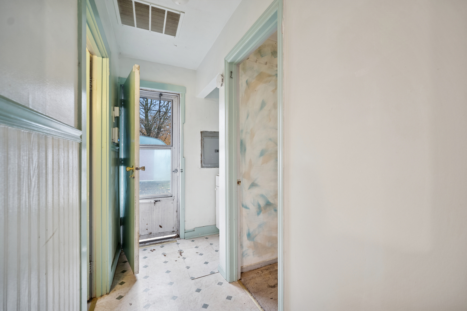 215 Second Street Elgin, IL 60123 - Photo 5 of 19 a bathroom with a glass door shower and a sink