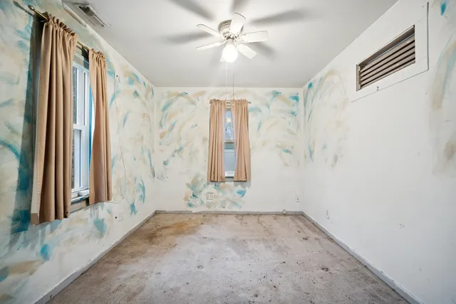 a view of a bathroom with a shower curtain and a shower