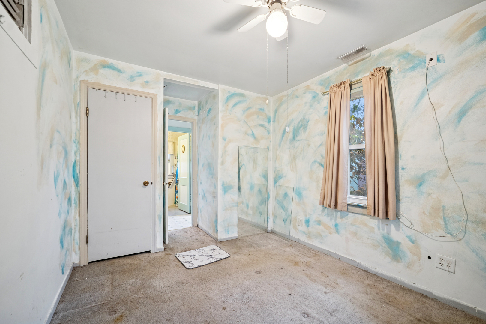 215 Second Street Elgin, IL 60123 - Photo 10 of 19 a view of an empty room with a window