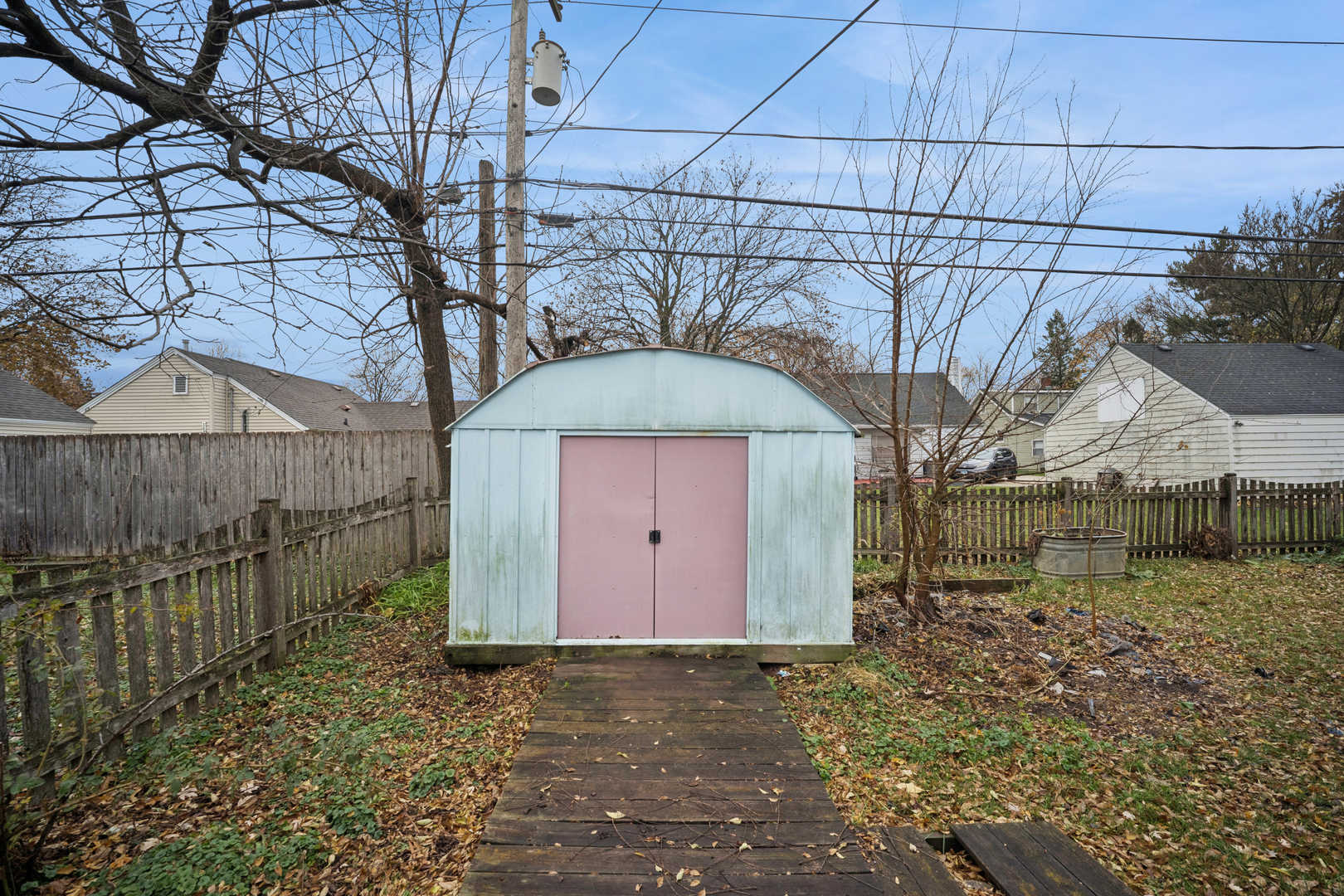 215 Second Street Elgin, IL 60123 - Photo 10 of 15 a front view of a house with a yard