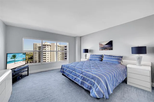 a view of a building with a yard