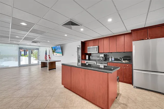 a view of a building with sitting area