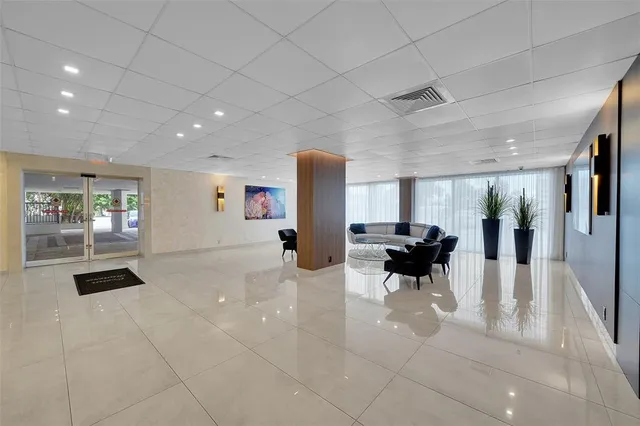 a view of a hallway with washer and dryer