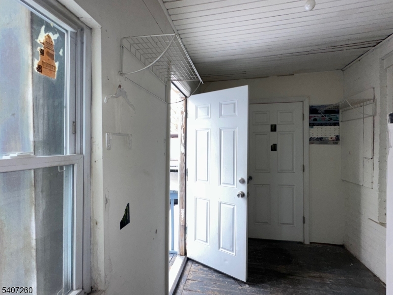 336 Broad Street, Unit 2 Bloomfield, NJ 07003 - Photo 22 of 24 a view of a hallway with wooden floor and entryway