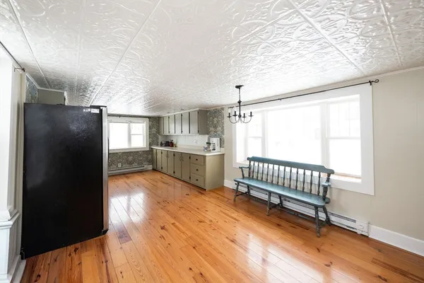 a bathroom with a sink and a window