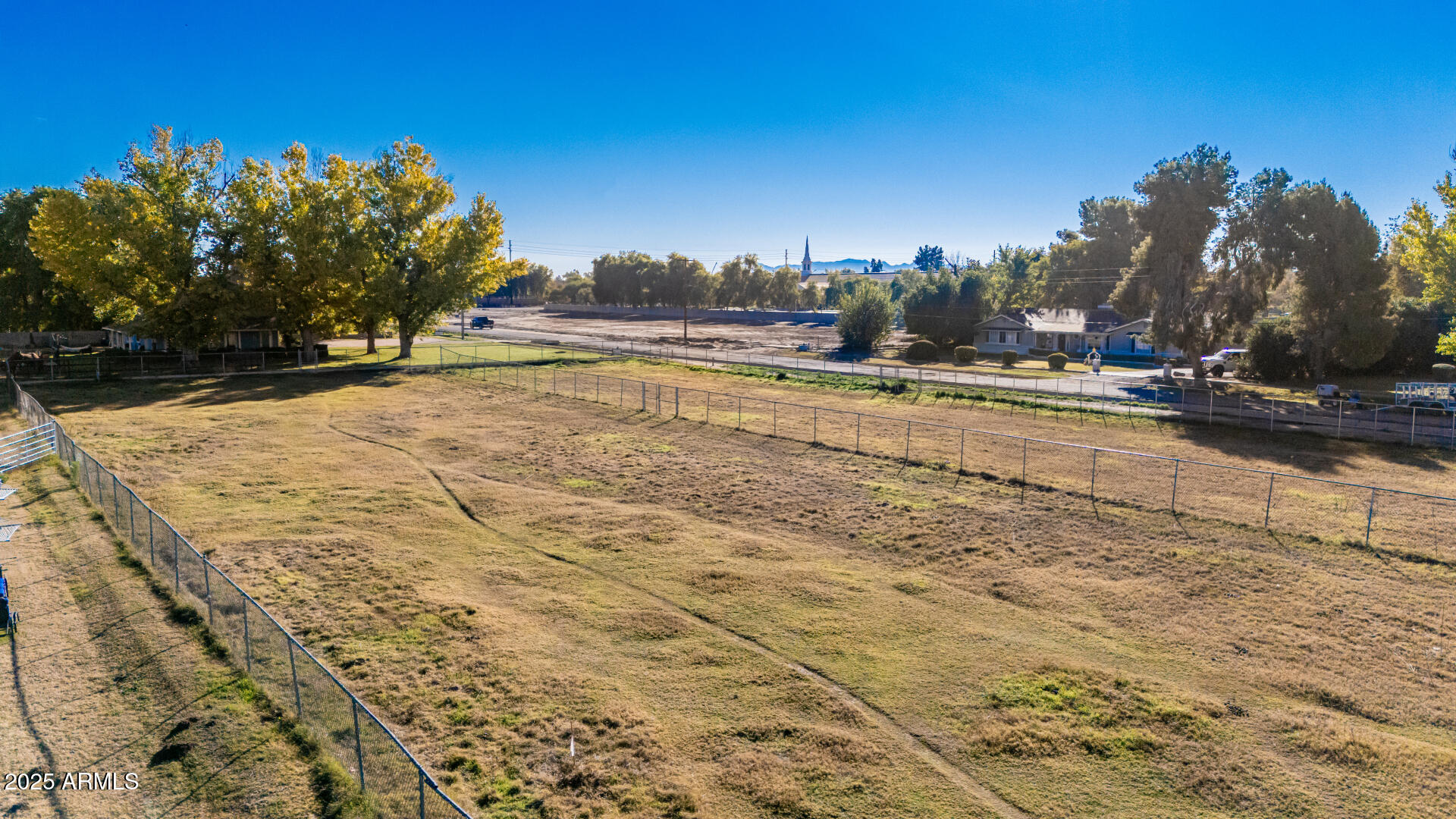 Xxx East Appleby Road Gilbert, AZ 85298 - Photo 14 of 17 a view of a yard with trees
