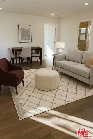 a living room with furniture and a table