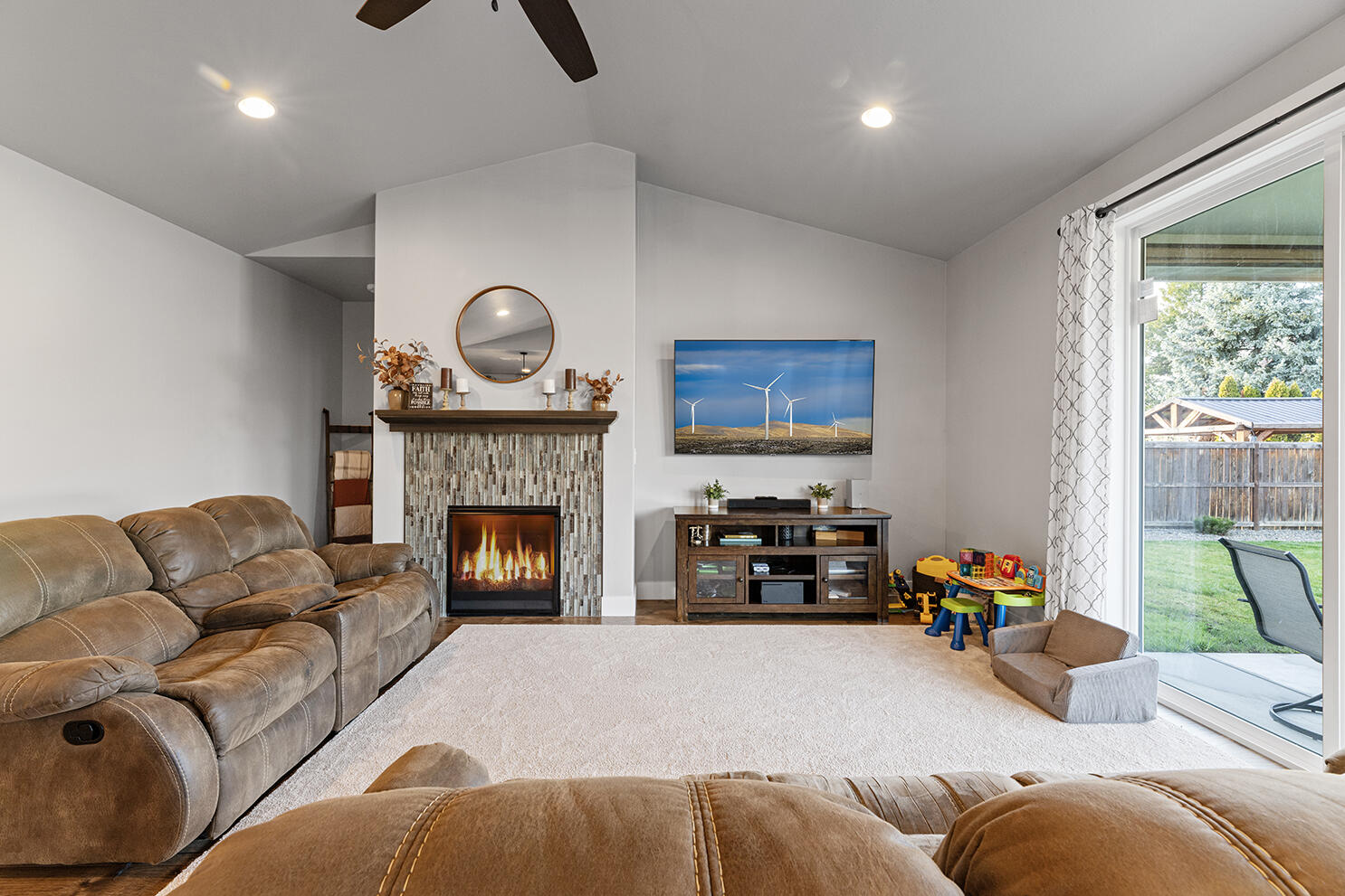 1043 Arrowhead Trail Eagle Point, OR 97524 - Photo 11 of 29 a living room with furniture and a fireplace