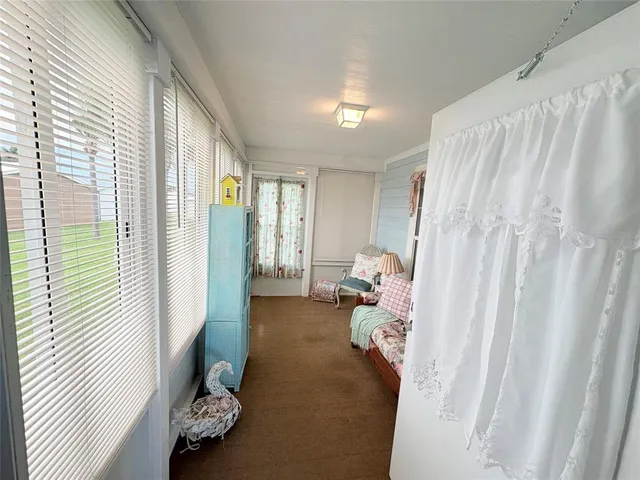 a living room with furniture and a gate