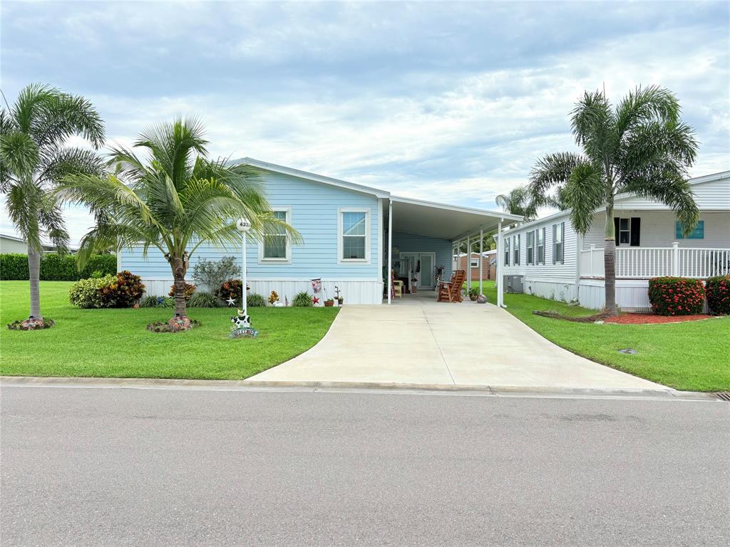 4331 Southwest 10th Way Okeechobee, FL 34974 - Photo 36 of 49 a front view of house with yard and green space
