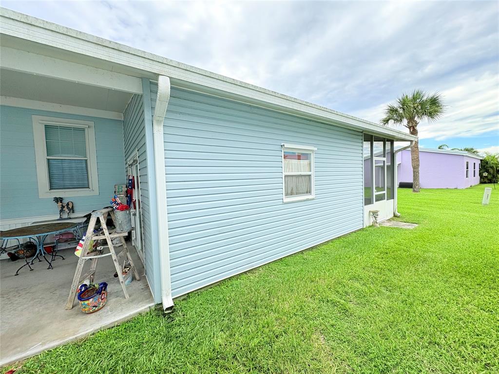 4331 Southwest 10th Way Okeechobee, FL 34974 - Photo 42 of 49 a view of a house with a backyard