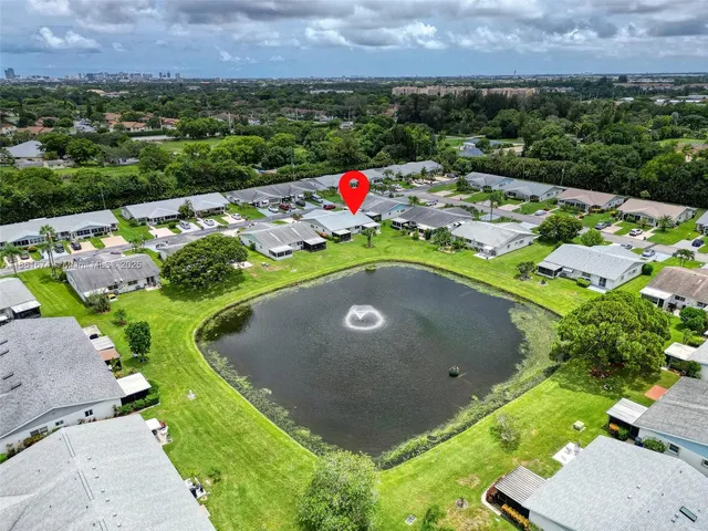a view of a city with a lake