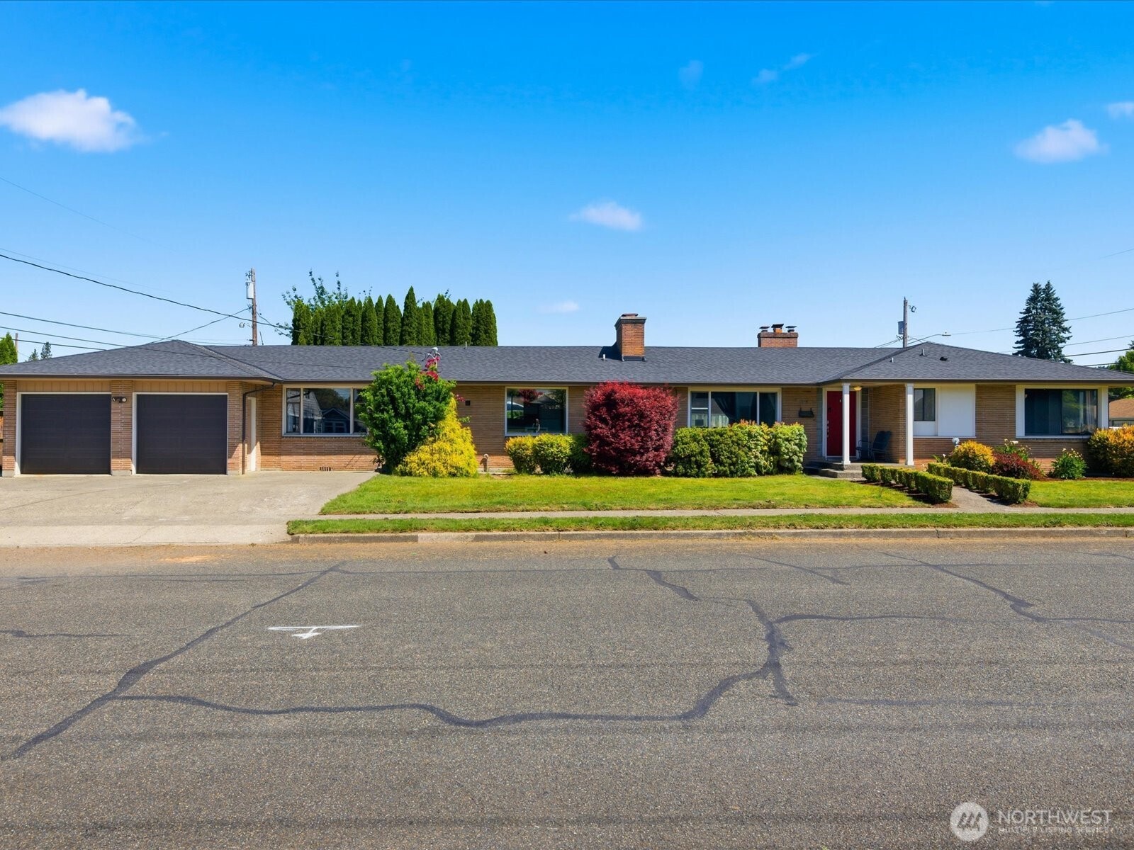 1417 Maple Street Sumner, WA 98390 - Photo 1 of 40 front view of house with a yard and potted plants