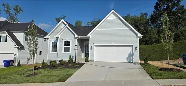 a view of house with yard