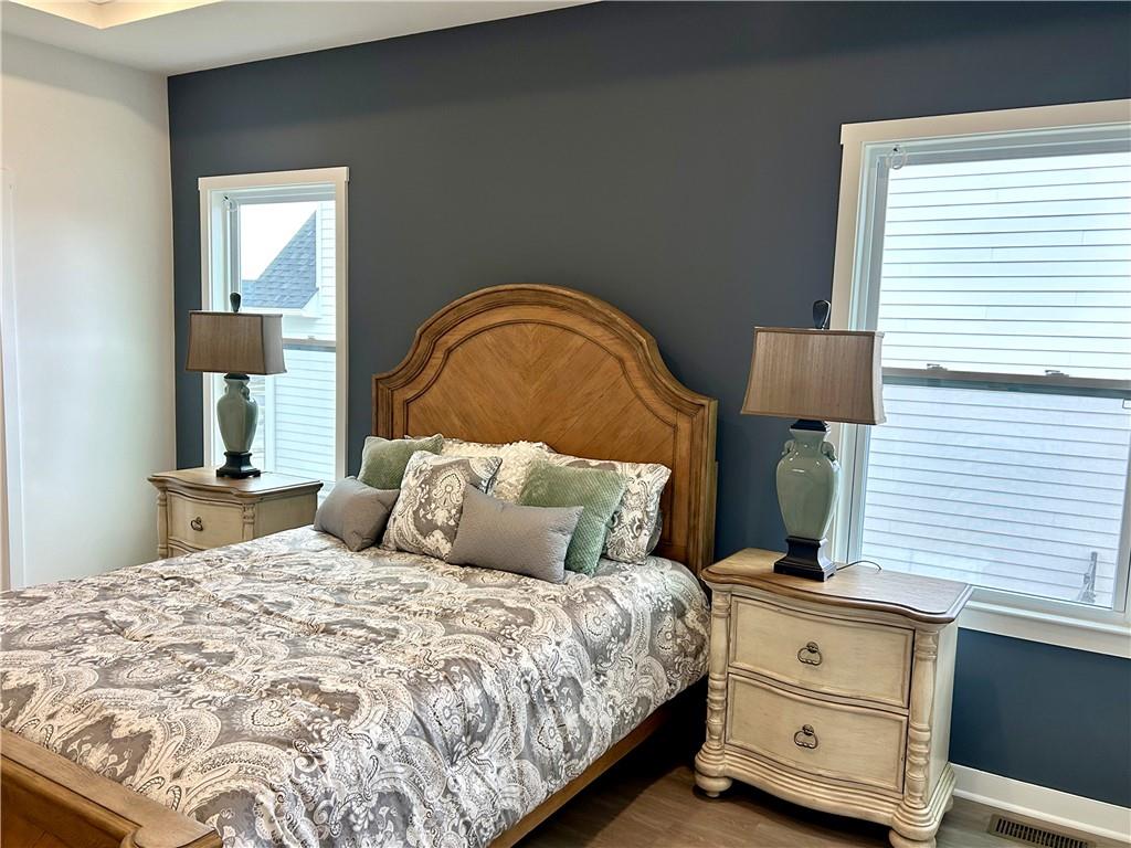 1002 Whistler Way Mars, PA 16046 - Photo 11 of 23 a bedroom with a bed and mirror