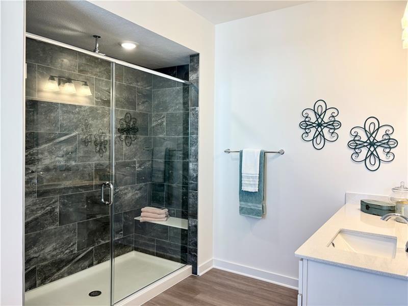 1002 Whistler Way Mars, PA 16046 - Photo 17 of 23 a bathroom with a shower and a sink