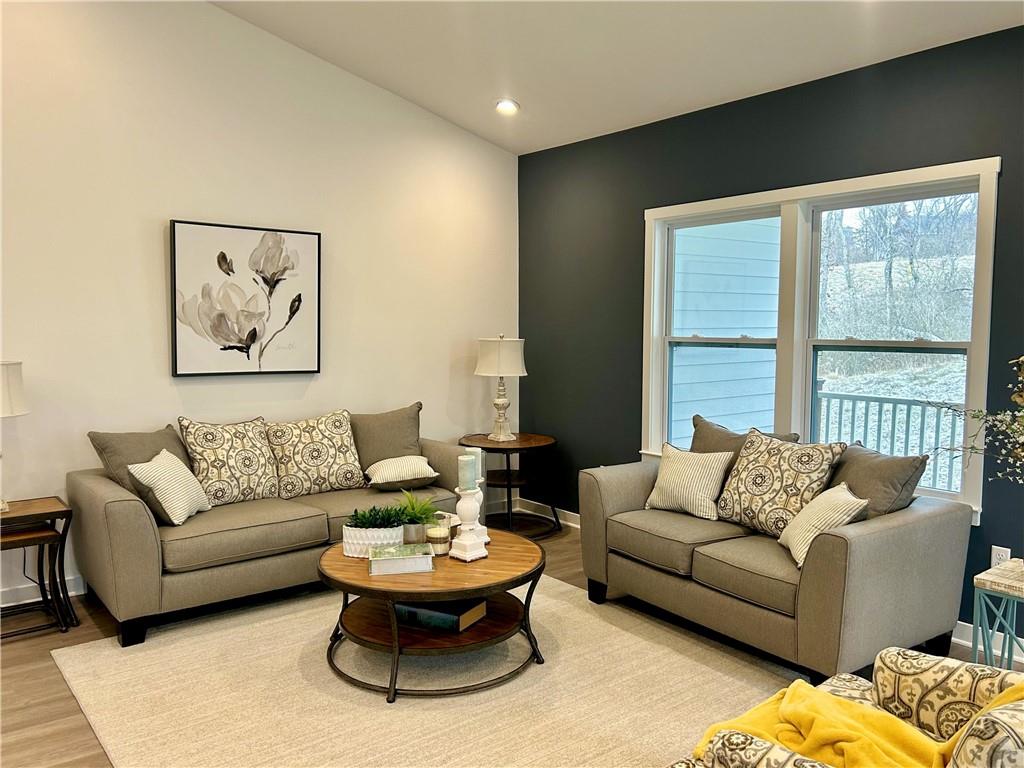 1002 Whistler Way Mars, PA 16046 - Photo 8 of 23 a living room with furniture and a large window
