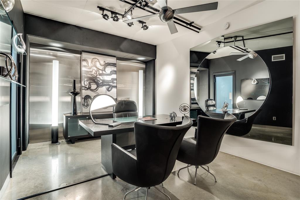 2011 Cedar Springs Road, Unit 606 Dallas, TX 75201 - Photo 15 of 33 a dining hall with couches a flat tv screen and a dining table with garden view