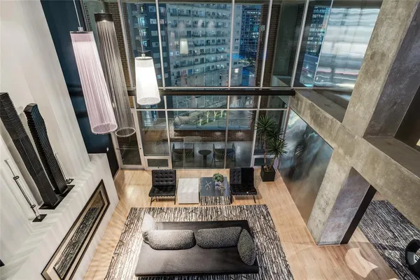 a view of living room with furniture and a window