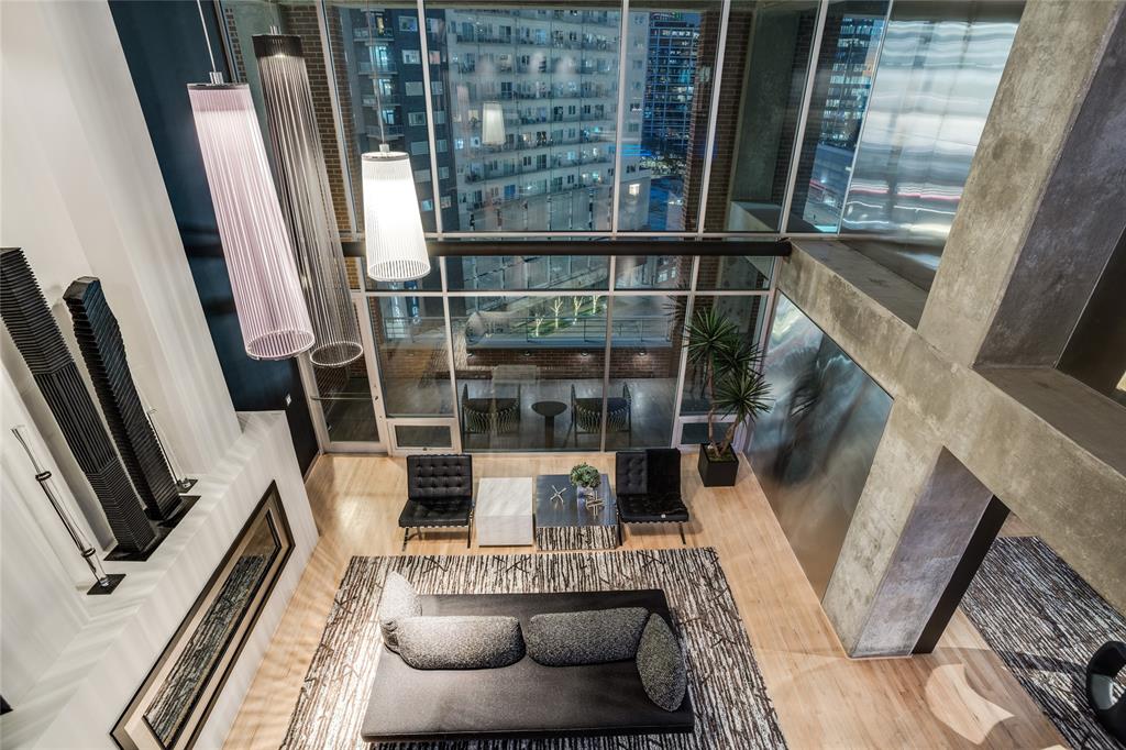 2011 Cedar Springs Road, Unit 606 Dallas, TX 75201 - Photo 18 of 33 a view of living room with furniture and a window