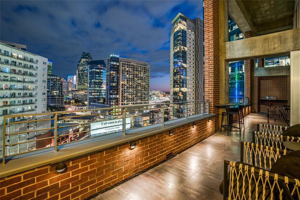 2011 Cedar Springs Road, Unit 606 Dallas, TX 75201 - Photo 26 of 33 a view of swimming pool with outdoor seating