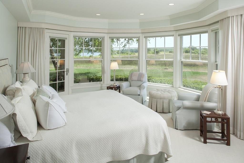 523 Barneys Joy Road Dartmouth, MA 02748 - Photo 12 of 39 a bedroom with bed and a large window