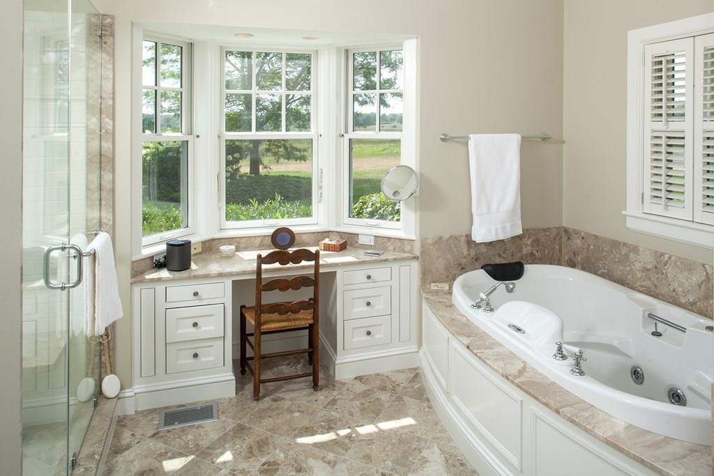 523 Barneys Joy Road Dartmouth, MA 02748 - Photo 13 of 39 a bathroom with a tub sink and window