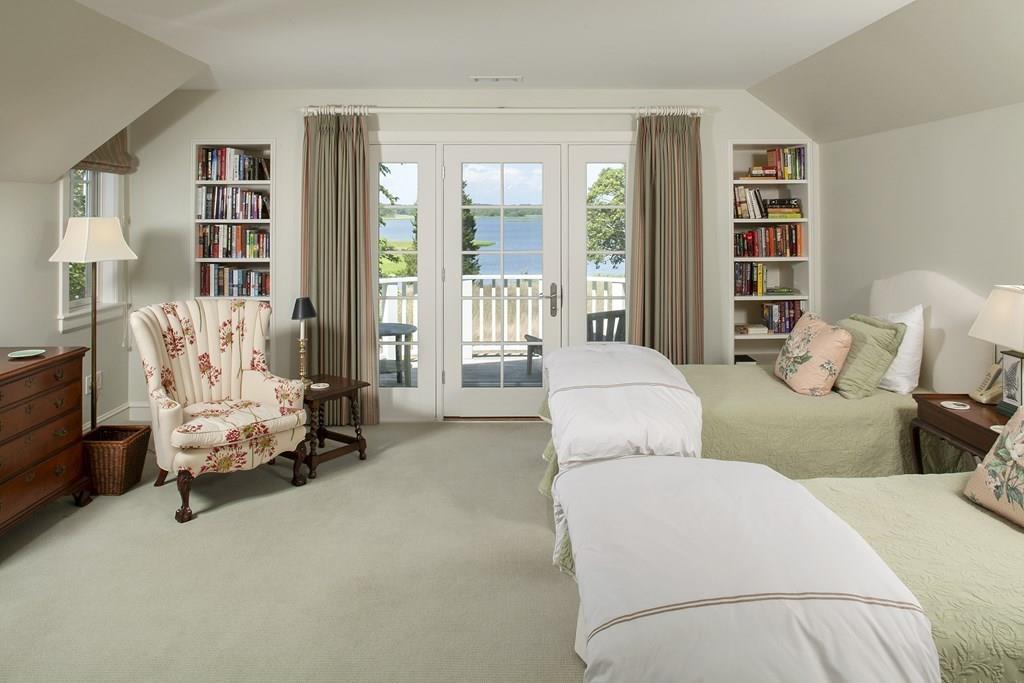 523 Barneys Joy Road Dartmouth, MA 02748 - Photo 19 of 39 a bedroom with furniture and a large window