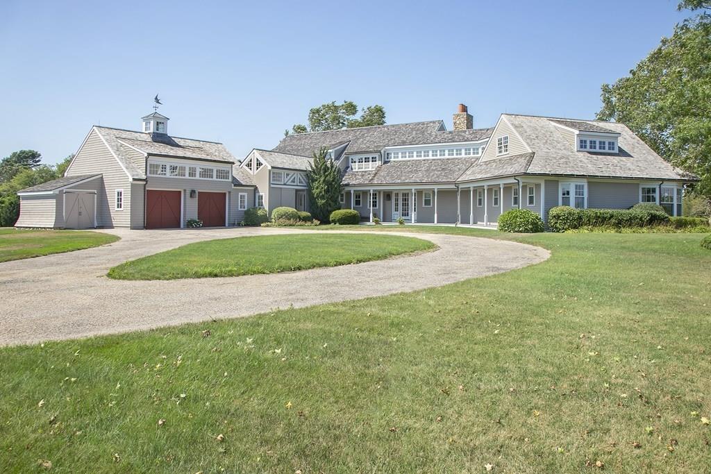 523 Barneys Joy Road Dartmouth, MA 02748 - Photo 2 of 39 a front view of a house with a garden