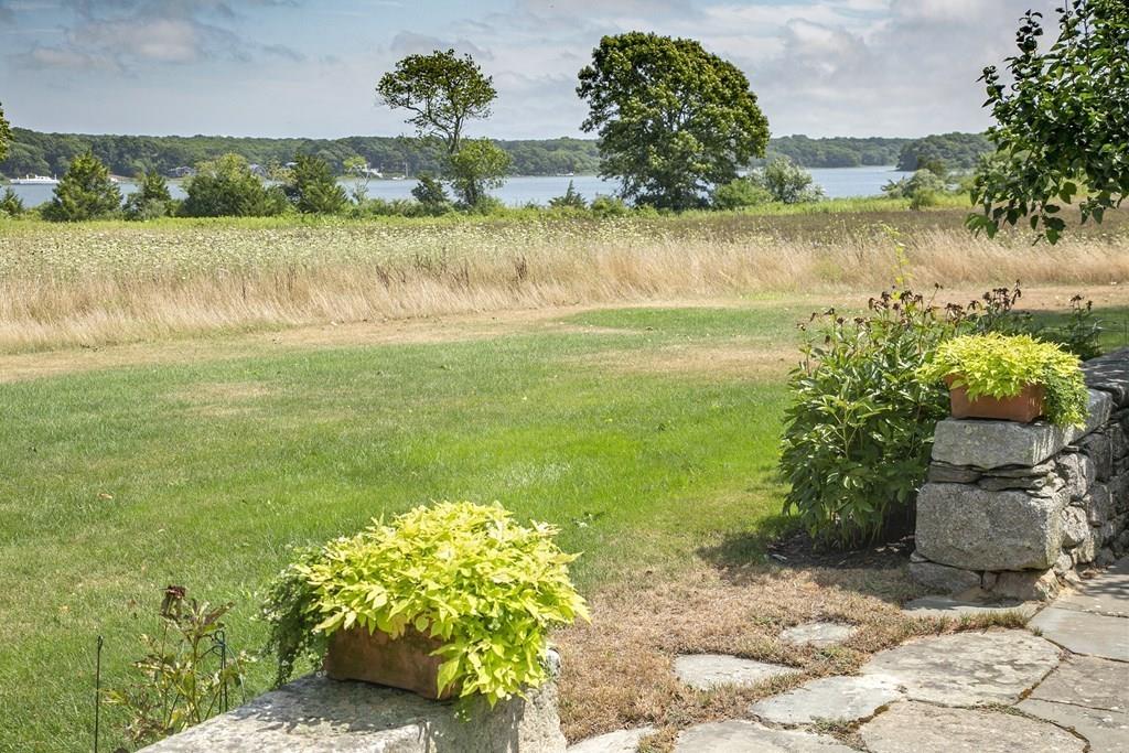 523 Barneys Joy Road Dartmouth, MA 02748 - Photo 27 of 39 a view of a lake with a yard