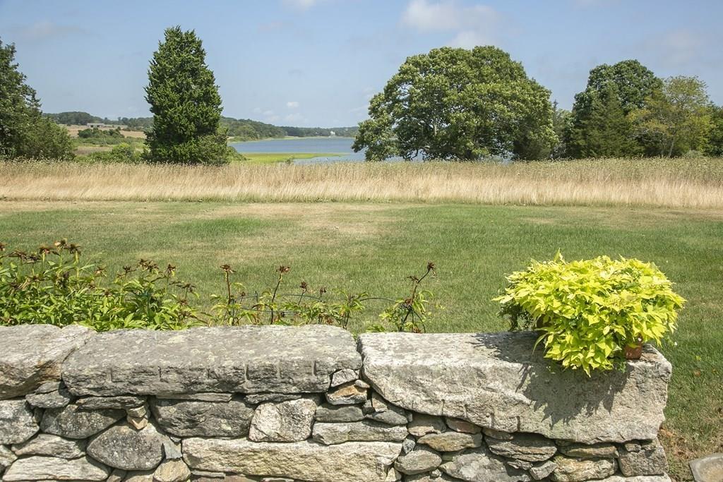 523 Barneys Joy Road Dartmouth, MA 02748 - Photo 29 of 39 a view of a lake with a yard