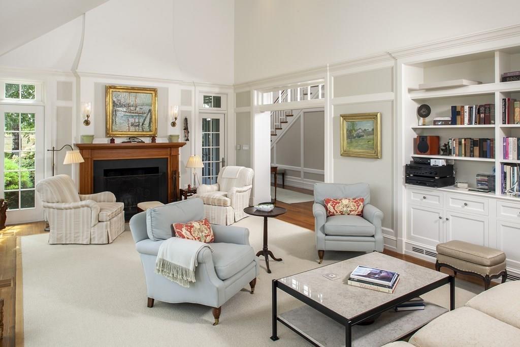 523 Barneys Joy Road Dartmouth, MA 02748 - Photo 4 of 39 a living room with furniture a rug and a fireplace