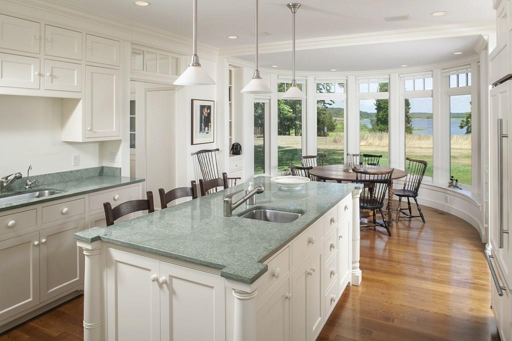 523 Barneys Joy Road Dartmouth, MA 02748 - Photo 6 of 39 a kitchen with stainless steel appliances granite countertop a sink and a wooden floors