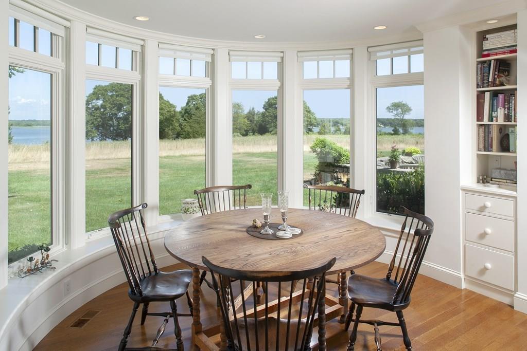 523 Barneys Joy Road Dartmouth, MA 02748 - Photo 7 of 39 a view of a dining room with furniture window and wooden floor