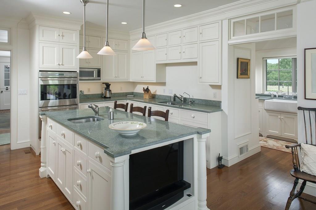 523 Barneys Joy Road Dartmouth, MA 02748 - Photo 8 of 39 a kitchen with stainless steel appliances granite countertop a sink a stove and a refrigerator