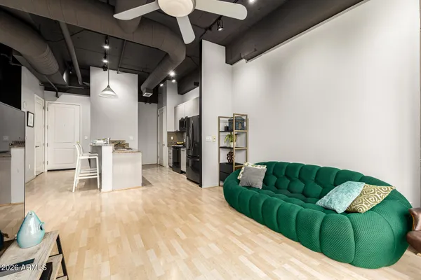 a living room with furniture and a couch
