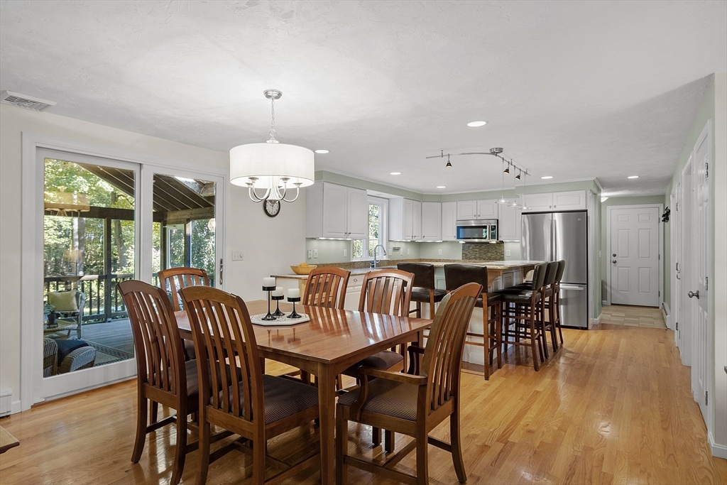 3 Brandy Hollow Littleton, MA 01460 - Photo 12 of 40 a view of a dining room with furniture window and wooden floor