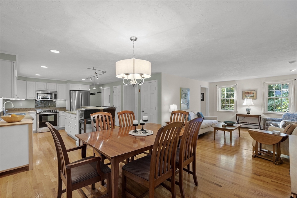 3 Brandy Hollow Littleton, MA 01460 - Photo 13 of 40 a view of a dining room with furniture window and wooden floor