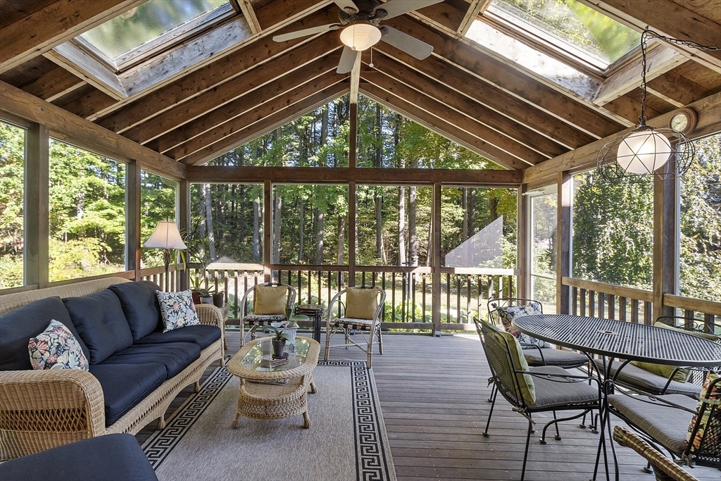3 Brandy Hollow Littleton, MA 01460 - Photo 15 of 40 a balcony with furniture and wooden floor