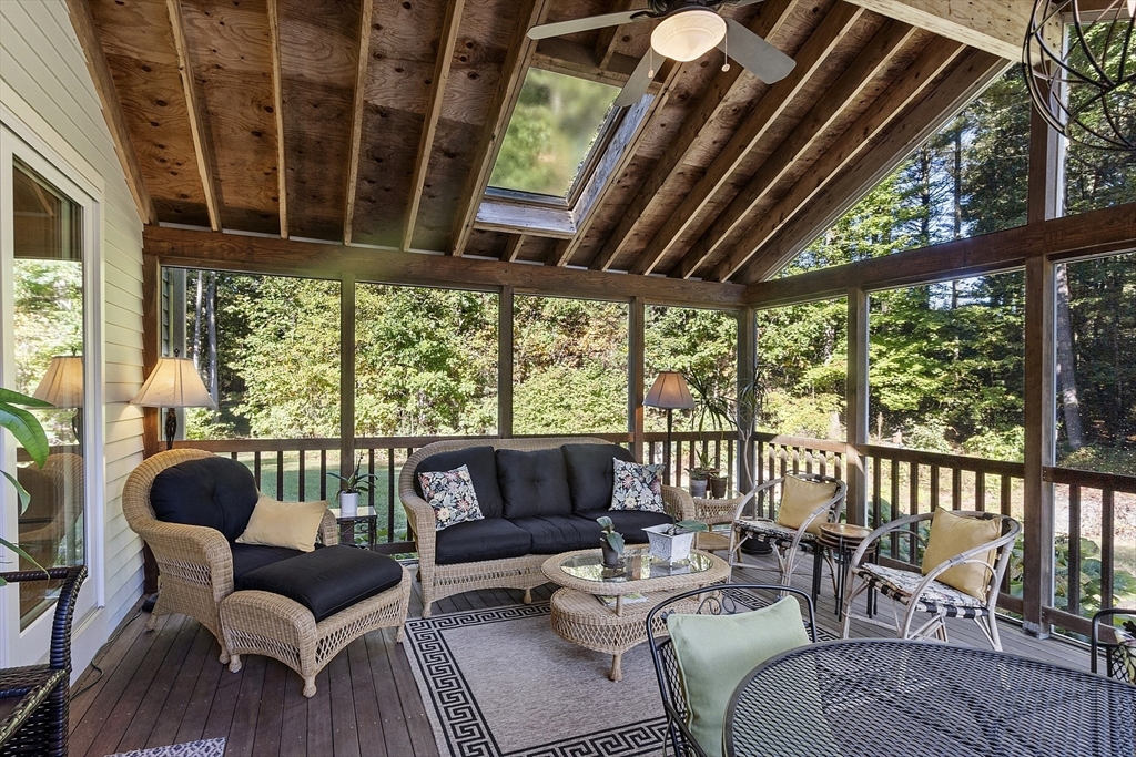 3 Brandy Hollow Littleton, MA 01460 - Photo 16 of 40 a balcony with furniture and a large window