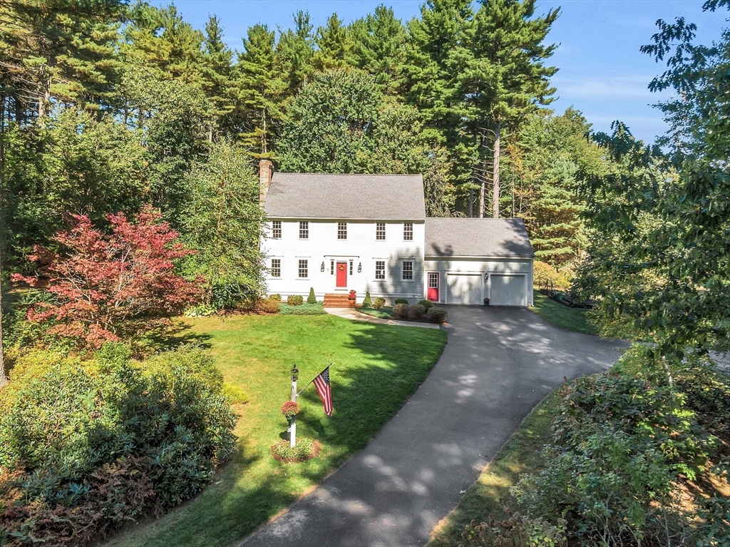 3 Brandy Hollow Littleton, MA 01460 - Photo 2 of 40 a view of a house with garden and pathway